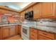 Kitchen with stainless steel appliances and granite countertops at 5736 Ashton Lake Dr, Sarasota, FL 34231