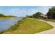Scenic view of Legacy Trail with cyclists, beautiful waterways and lush foliage at 5736 Ashton Lake Dr, Sarasota, FL 34231