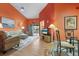Cozy condo living room featuring high ceilings, neutral furniture, and a bright, airy feel at 5736 Ashton Lake Dr, Sarasota, FL 34231