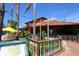 Outdoor dining available at this quaint village restaurant with a brightly colored fence and signage at 5736 Ashton Lake Dr, Sarasota, FL 34231