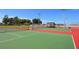 Well-maintained community tennis courts with lush landscaping and a covered picnic area at 5736 Ashton Lake Dr, Sarasota, FL 34231