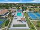 Aerial view of a beautiful community pool and cabana area providing a resort-style living experience at 672 White Pine Tree Rd # 57, Venice, FL 34285