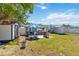 Well-maintained backyard featuring a shed, patio area with seating, and ample space for activities and relaxing at 6720 Northampton Pl, Bradenton, FL 34207