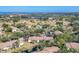Scenic aerial view of the community showcasing lush landscaping and nearby coastal views at 752 White Pine Tree Rd # 101, Venice, FL 34285
