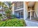 Charming condo featuring a screened lanai and lush landscaping, perfect for relaxing outdoors at 752 White Pine Tree Rd # 101, Venice, FL 34285