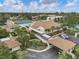 A spacious community hall with tables, chairs, and natural light, perfect for gatherings at 752 White Pine Tree Rd # 101, Venice, FL 34285