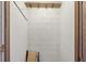 Storage room featuring cinder block walls and wooden shelving at 752 White Pine Tree Rd # 101, Venice, FL 34285