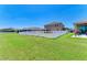 Large backyard with green grass and a white fence surrounding the property at 7822 110Th E Ave, Parrish, FL 34219