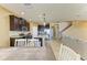 Well-designed kitchen with dark cabinets, granite countertops, stainless steel appliances, and breakfast bar at 7822 110Th E Ave, Parrish, FL 34219