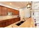 Well-equipped kitchen with granite countertops, mosaic backsplash, and ample cabinet space at 7822 110Th E Ave, Parrish, FL 34219