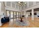 Grand lobby featuring a large chandelier, high ceilings, and an inviting seating area at 7822 110Th E Ave, Parrish, FL 34219