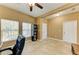 The office space features neutral walls, tile flooring, and two bright windows at 7822 110Th E Ave, Parrish, FL 34219