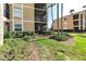 This inviting backyard has a lush lawn and garden, creating an ideal retreat for outdoor enjoyment at 8205 Grand Estuary Trl # 101, Bradenton, FL 34212