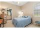 Bedroom with a view to an en suite bathroom at 8838 Bloomfield Blvd, Sarasota, FL 34238