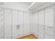 Walk-in closet with white wire shelving, offering ample storage space at 8995 Founders Cir, Palmetto, FL 34221