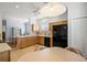 Charming eat-in kitchen with an adjacent dining area, modern appliances, and ample counter space at 8995 Founders Cir, Palmetto, FL 34221