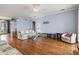 Spacious living room with wood floors and comfortable furnishings at 8995 Founders Cir, Palmetto, FL 34221