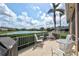 This patio boasts a waterfront view, providing a serene backdrop for outdoor living and entertaining at 8995 Founders Cir, Palmetto, FL 34221