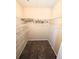 Walk-in closet with wire shelving at 105 S Obrien St # 213, Tampa, FL 33609