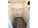 Walk-in closet featuring carpeted flooring and wire shelving for optimal storage at 105 S Obrien St # 213, Tampa, FL 33609
