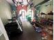 Well-equipped community gym with treadmills, weights, and mirrored walls for a complete fitness experience at 105 S Obrien St # 213, Tampa, FL 33609