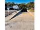 Concrete boat ramp with parking spots, perfect for boating and enjoying waterfront activities at 112 Park Ter, Venice, FL 34285