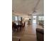Inviting open floor plan features a dining area, breakfast bar, and comfortable living space at 112 Park Ter, Venice, FL 34285