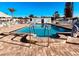 Community pool and sun deck on a bright and sunny day at 112 Park Ter, Venice, FL 34285