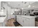 Open kitchen with center island, stainless appliances, and seamless flow to the living area at 11713 Goldenrod Ave, Bradenton, FL 34212