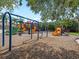 A colorful playground with swings, slides, and climbing structures provides a fun and engaging space for children at 11713 Goldenrod Ave, Bradenton, FL 34212