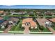 Desirable home with well-kept landscaping and a tranquil lake view at 12012 Legacy Estates Blvd, Sarasota, FL 34238