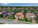 Lovely home surrounded by manicured lawns and a serene lake at 12012 Legacy Estates Blvd, Sarasota, FL 34238