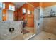 Bright bathroom with glass shower, tile flooring, and contemporary fixtures creating a clean aesthetic at 12012 Legacy Estates Blvd, Sarasota, FL 34238