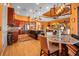 Open-concept kitchen and dining area with a breakfast nook and living room with plenty of natural light at 12012 Legacy Estates Blvd, Sarasota, FL 34238