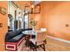Cozy breakfast nook features a built-in bench, a table, and a large window with views of the outdoors at 12012 Legacy Estates Blvd, Sarasota, FL 34238
