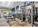 Modern gym equipped with weight machines, treadmills, and free weights, plus plenty of open space at 12012 Legacy Estates Blvd, Sarasota, FL 34238