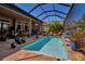 Lovely pool with brick deck and screen enclosure for bug free enjoyment at 12012 Legacy Estates Blvd, Sarasota, FL 34238