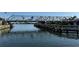 View of bridge over water showing its pilings and the channel marker at 12291 Myrtle Bay Ct, Sarasota, FL 34238