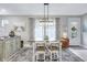 Bright dining area features stylish table with seating for four and decorative accents at 12291 Myrtle Bay Ct, Sarasota, FL 34238