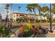 Charming shops in a tropical setting, landscaped with flowers and palm trees at 12291 Myrtle Bay Ct, Sarasota, FL 34238
