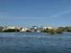 Scenic water view of bay, community buildings and boats at 12291 Myrtle Bay Ct, Sarasota, FL 34238