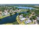 Wonderful aerial view featuring waterfront home with in-ground pool at 12339 Hollybush Ter, Lakewood Ranch, FL 34202