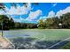 A basketball court offers a well-maintained surface and multiple hoops for neighborhood play at 12339 Hollybush Ter, Lakewood Ranch, FL 34202