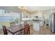 Eat-in kitchen featuring an island, stainless steel appliances, and bright natural light at 12339 Hollybush Ter, Lakewood Ranch, FL 34202