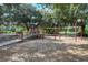 A modern playground area with climbing structures and play equipment for community children at 12339 Hollybush Ter, Lakewood Ranch, FL 34202