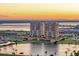 Beautiful condo community featuring water views, manicured green spaces, and convenient parking at 130 Riviera Dunes Way # 903, Palmetto, FL 34221