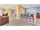 Resident common area features a bar and seating at 130 Riviera Dunes Way # 903, Palmetto, FL 34221
