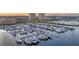 Bustling marina surrounded by luxury residential buildings, offering a vibrant waterfront lifestyle at 130 Riviera Dunes Way # 903, Palmetto, FL 34221