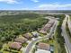 A bird's eye view of the community showcasing manicured lawns and single Gathering homes at 13319 Deep Blue Pl, Bradenton, FL 34211