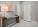 Bright entryway with marble floors, a decorative table, and contemporary design at 13319 Deep Blue Pl, Bradenton, FL 34211